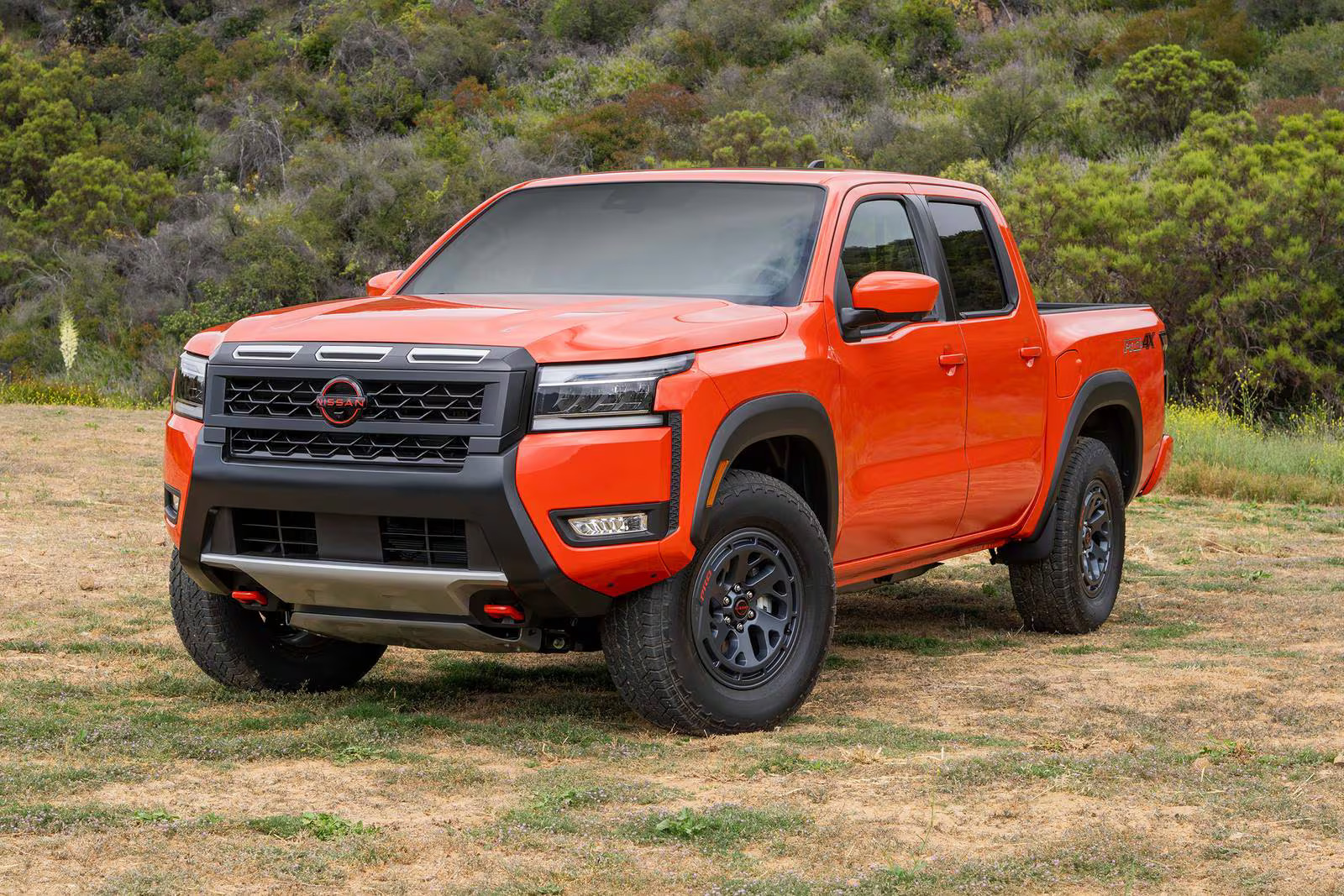 Front view of the 2026 Nissan Frontier midsize pickup truck showcasing bold exterior design and off-road capability view of the 2026 Nissan Frontier midsize pickup truck showcasing bold exterior design and off-road capability