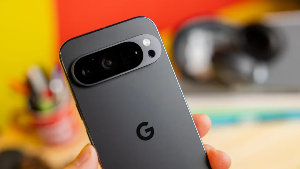 Close-up of Google Pixel 10 rear camera setup in sleek matte black finish, showcasing triple-lens design and LED flash